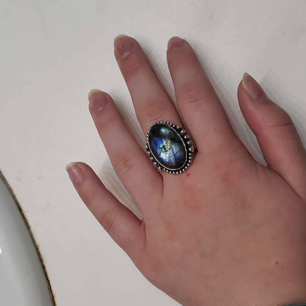 Blue ring set in silver band